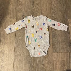 3/$12- Carter’s alphabet onesie